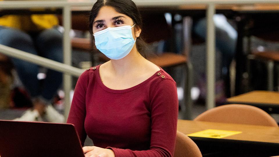 Advisor wearing mask